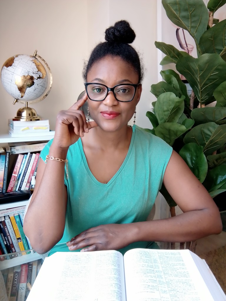 Ayoola Bandele reading the Bible while reflecting on healing, faith and emotional renewal.